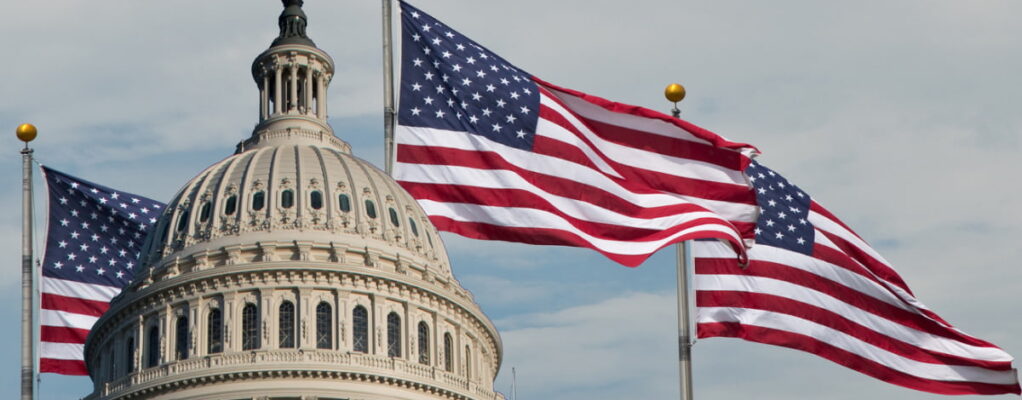 American flags and the Capitol